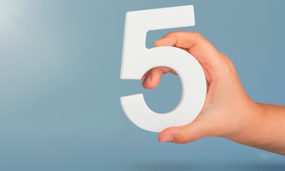 Customer hand reaching for 5 best MSP services