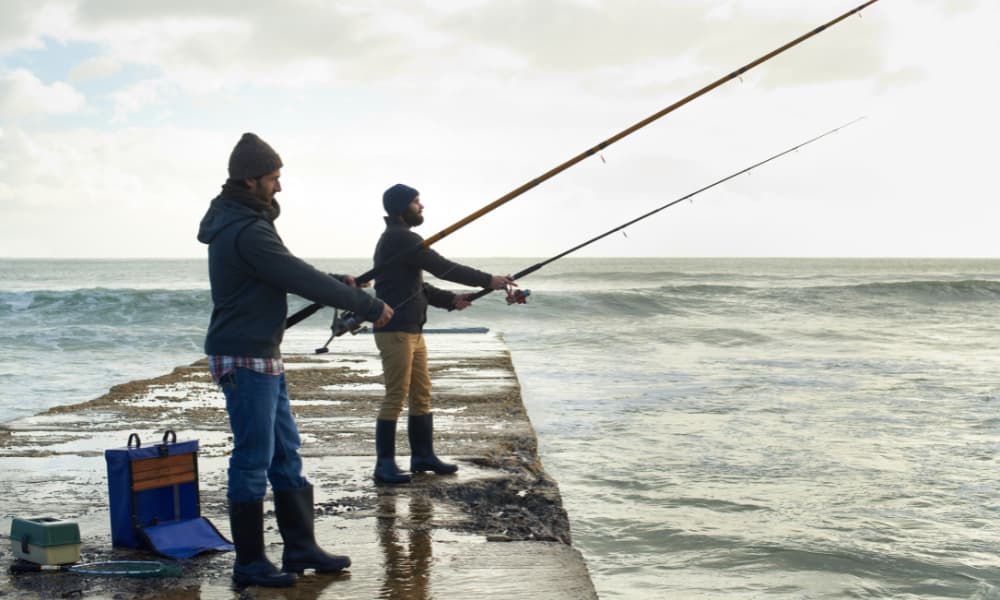 Two fishermen represent the dangerous practice of phishing